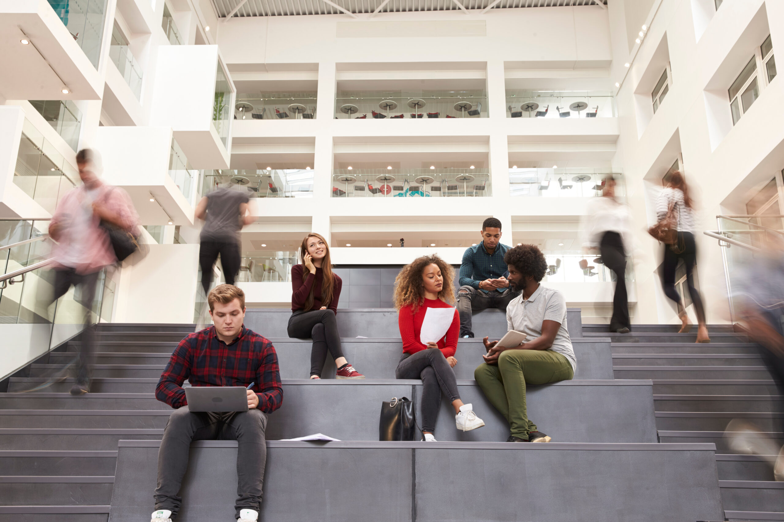 Interior Of Busy University Campus Building With Students